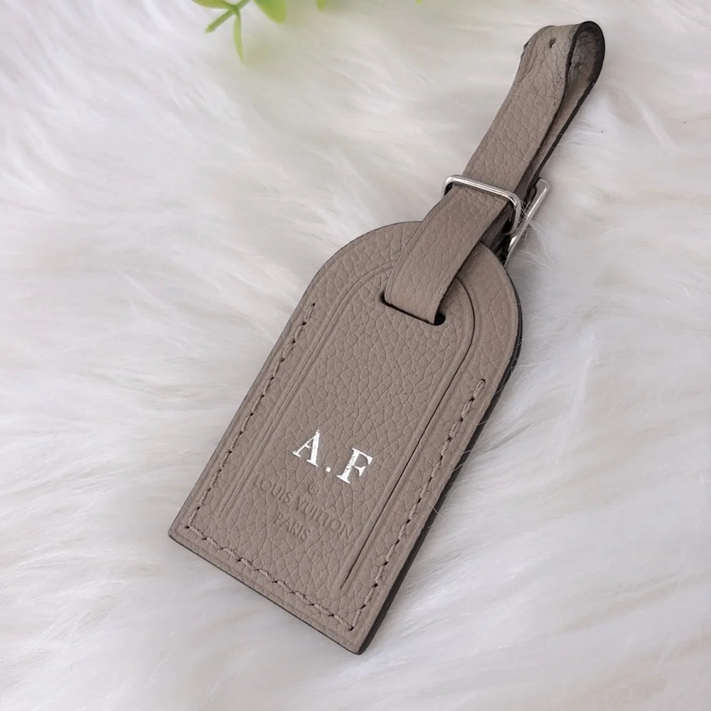 Louis Vuitton Taiga Leather Luggage Tag‎